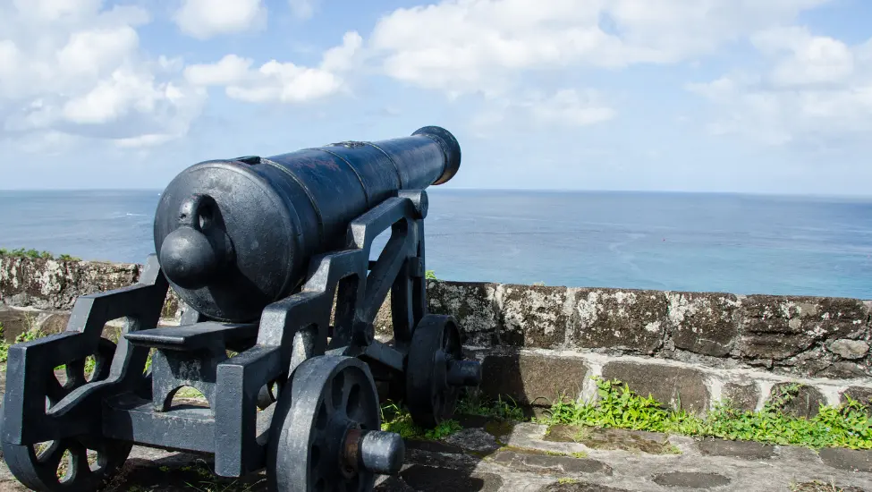 old cannon overlooking the sea