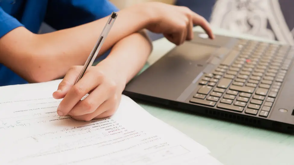 Writing with left hand and using the computer with the right hand